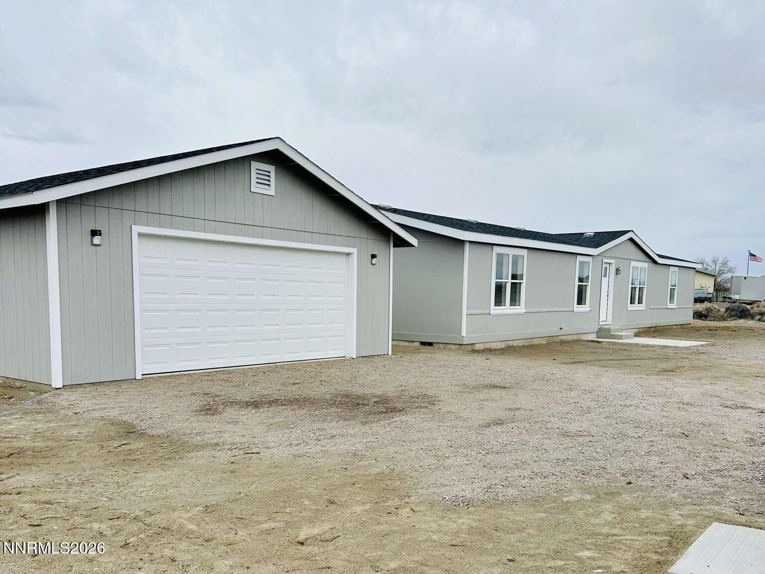 6255 Sierra Way Fallon, NV 89406 - Photo 2 of 25 a view of house and outdoor space
