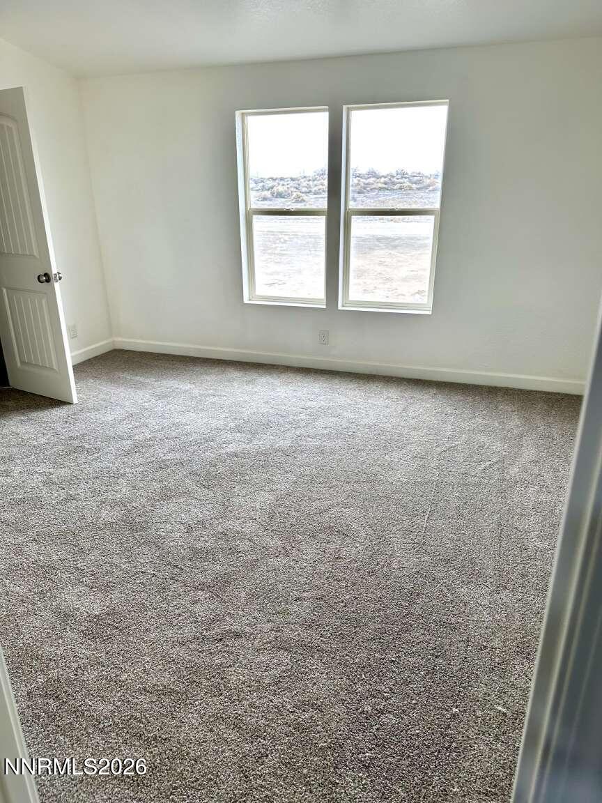 6255 Sierra Way Fallon, NV 89406 - Photo 8 of 25 an empty room with a window