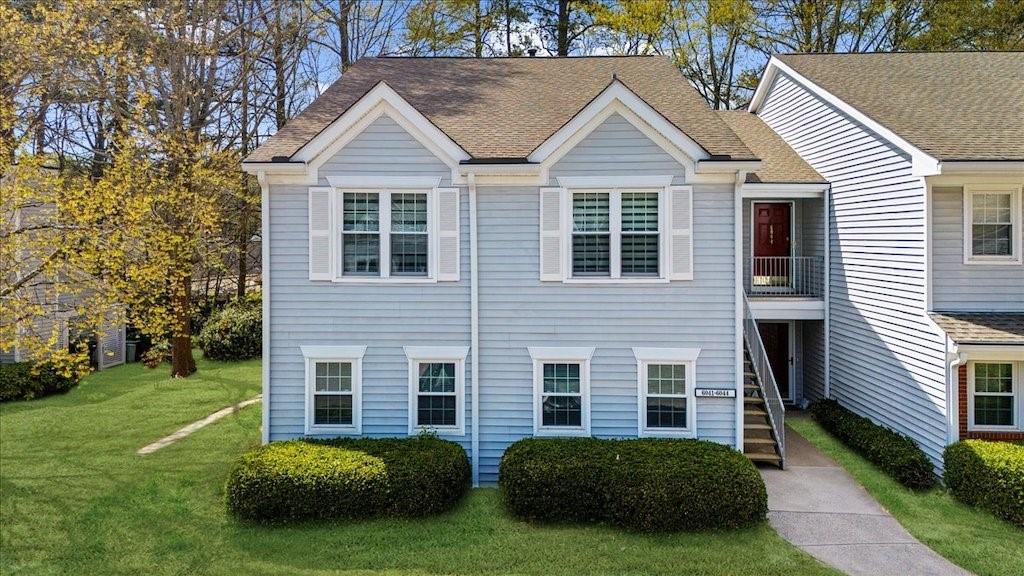6041 Coventry Circle Alpharetta, GA 30004 - Photo 1 of 1 a view of a house with a backyard