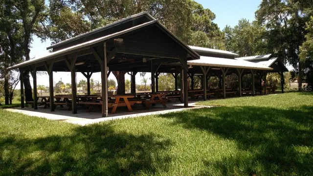 a view of a house with backyard and porch