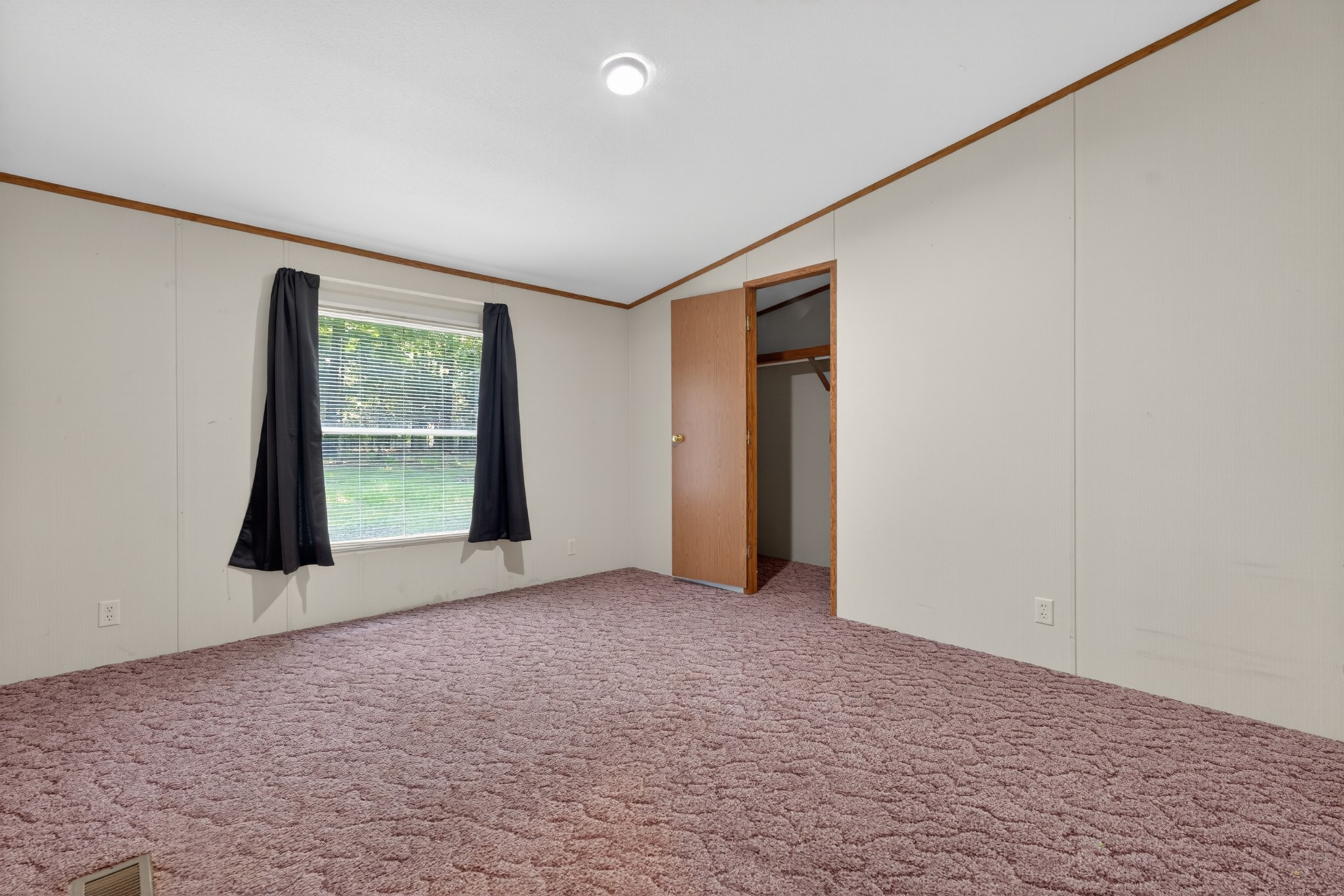 228 Shasteen Ridge Road Lynchburg, TN 37352 - Photo 14 of 53 an empty room with windows