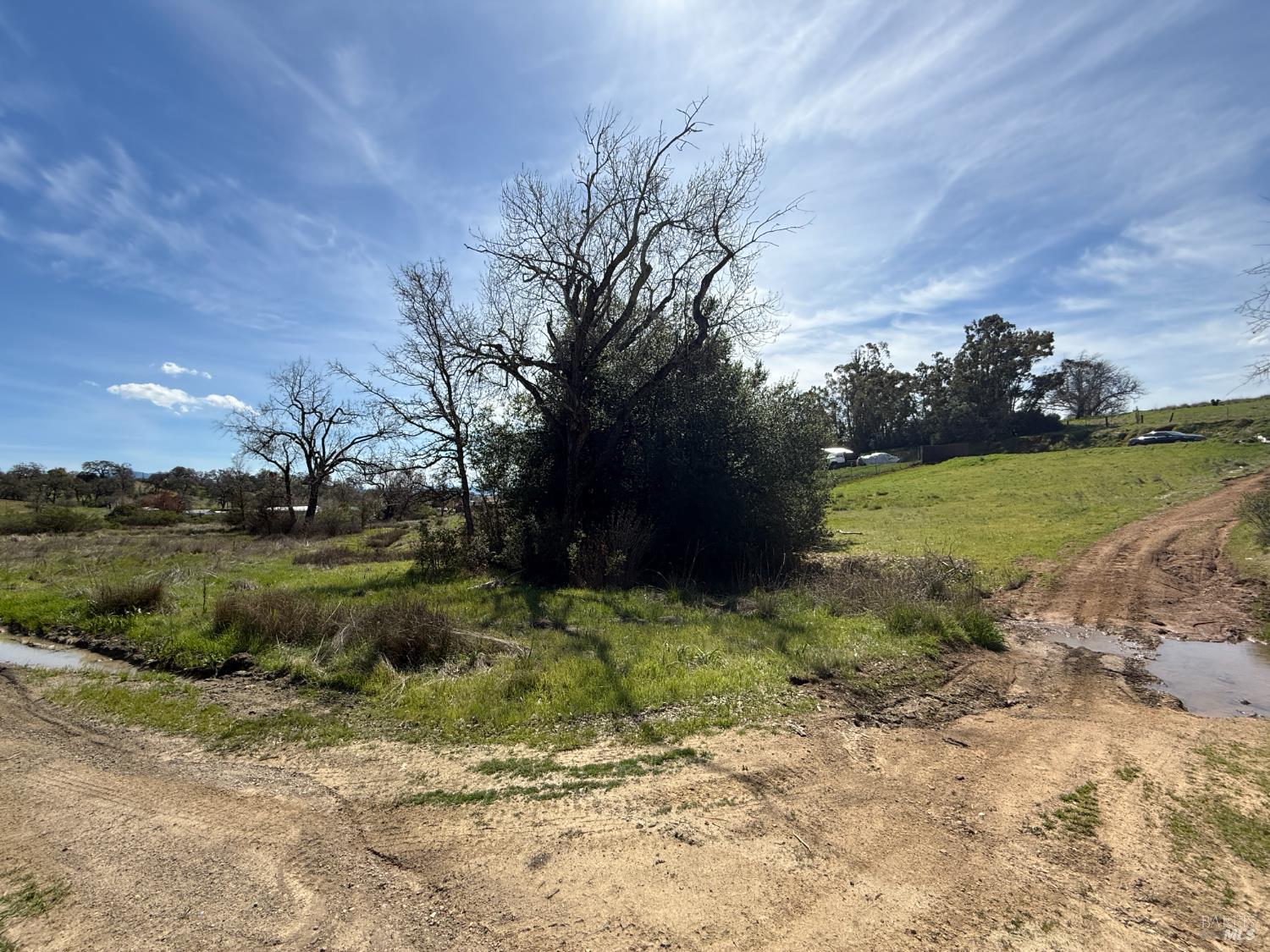 7535 Lake Street Nice, CA 95485 - Photo 3 of 3 a view of a road with a yard
