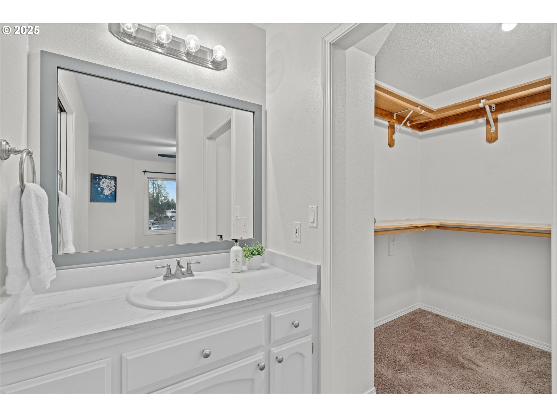 15975 Southwest 87th Avenue Portland, OR 97224 - Photo 18 of 35 a bathroom with a sink and a mirror