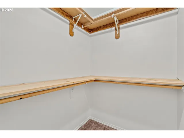 a bathroom with a toilet a sink and a mirror