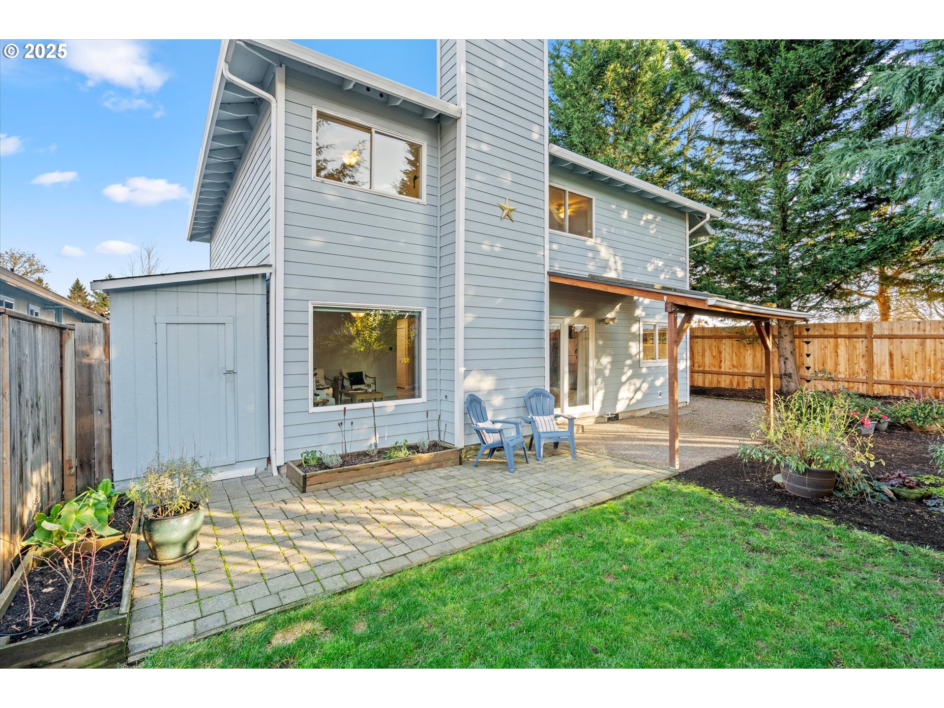 15975 Southwest 87th Avenue Portland, OR 97224 - Photo 26 of 35 a view of a house with backyard and sitting area