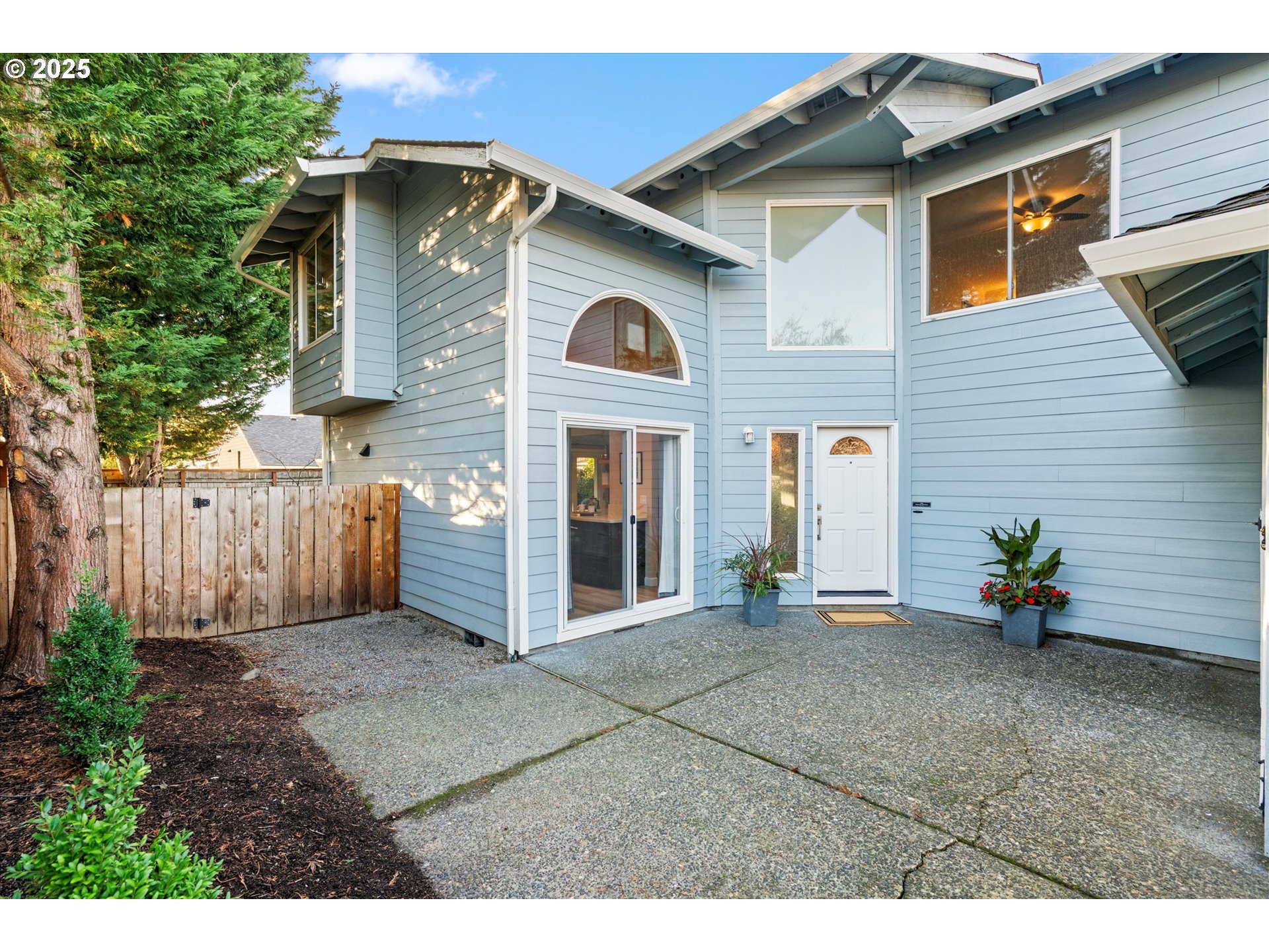 15975 Southwest 87th Avenue Portland, OR 97224 - Photo 3 of 35 a view of an house with backyard and furniture