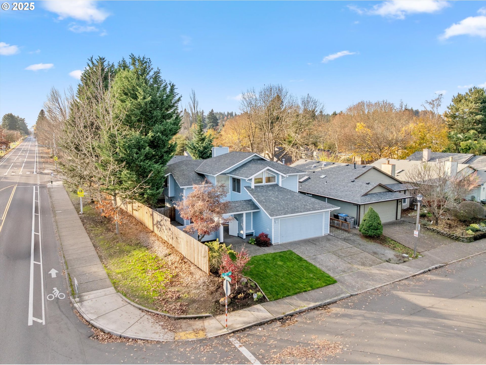 15975 Southwest 87th Avenue Portland, OR 97224 - Photo 31 of 35 a view of a house with a swimming pool