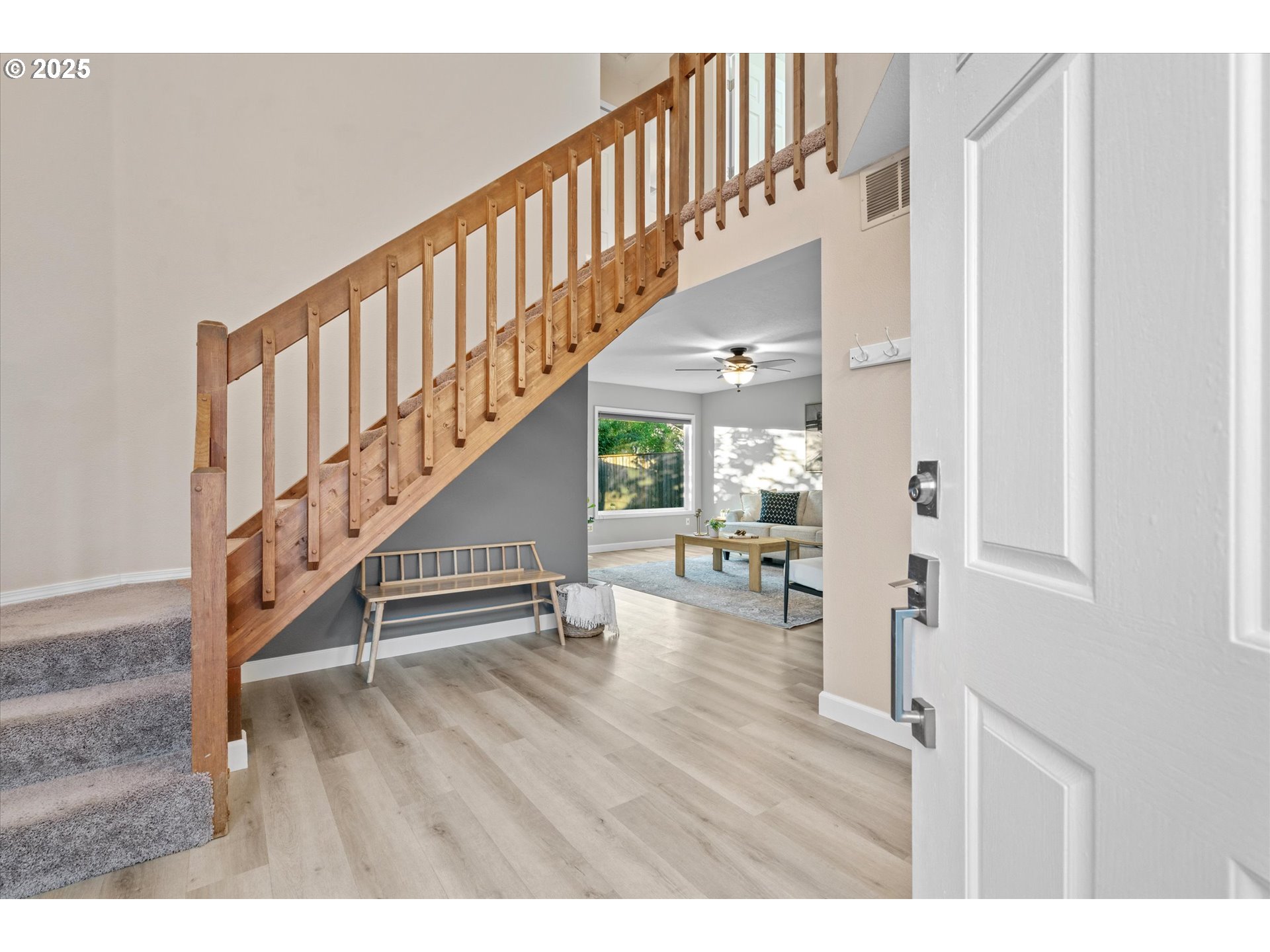 15975 Southwest 87th Avenue Portland, OR 97224 - Photo 4 of 35 a view of entryway and hall with wooden floor