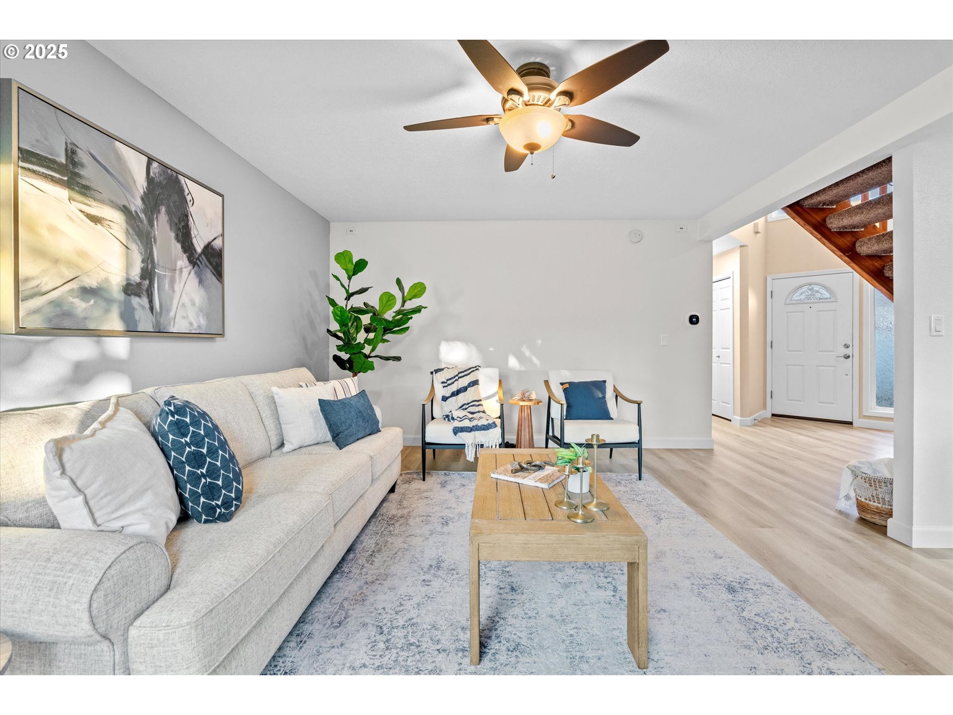 15975 Southwest 87th Avenue Portland, OR 97224 - Photo 7 of 35 a living room with furniture and a large window