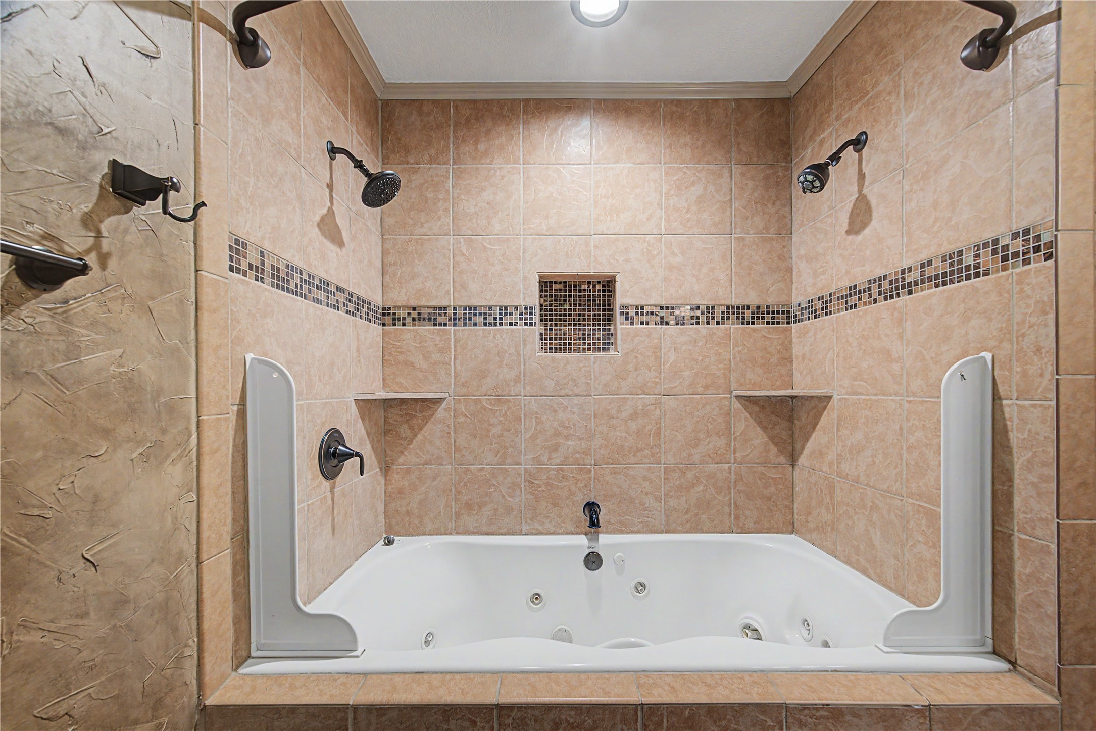 4210 Mossygate Drive Spring, TX 77373 - Photo 26 of 33 Primary bathroom oversized jetted soaking tub and dual showerheads.