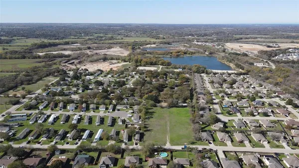 an aerial view of residential building with parking space