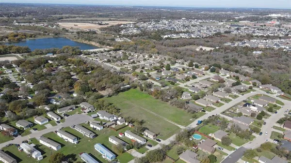an aerial view of a city with lots of residential buildings