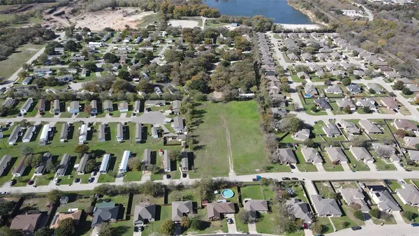 an aerial view of residential building and lake view