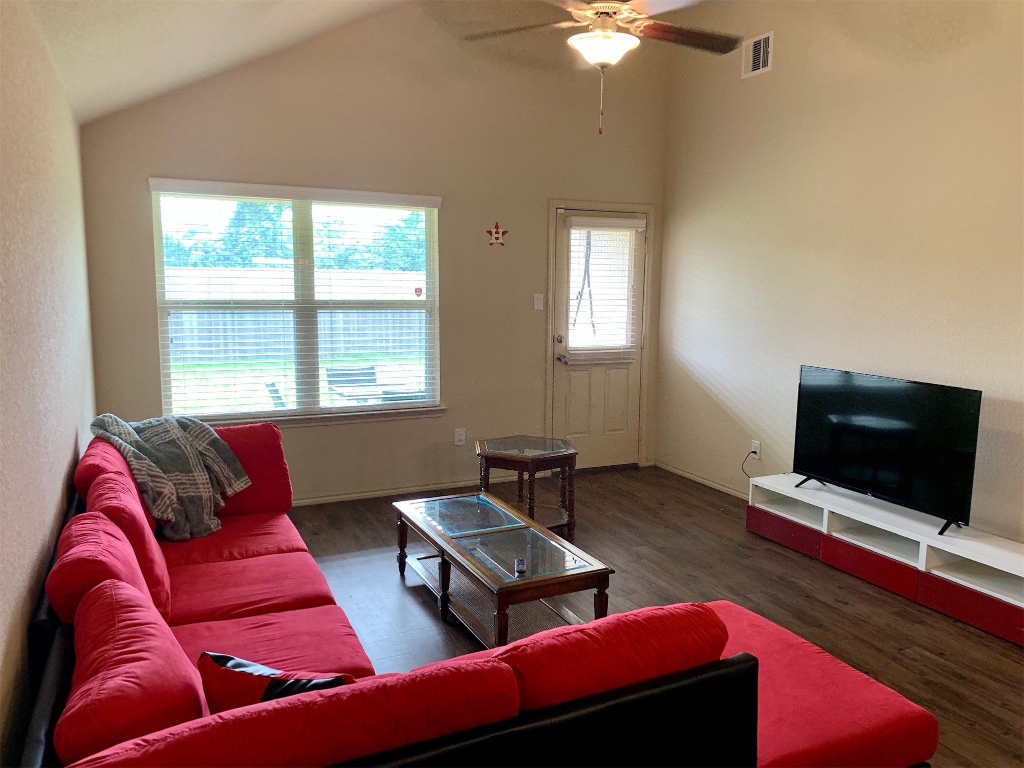 1345 Lariat Rdg Trail Houston, TX 77049 - Photo 15 of 25 a living room with furniture and a flat screen tv
