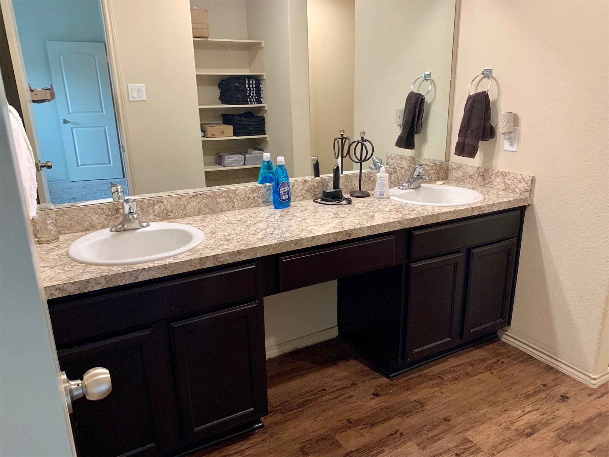 1345 Lariat Rdg Trail Houston, TX 77049 - Photo 18 of 25 a bathroom with a double vanity sink and a mirror
