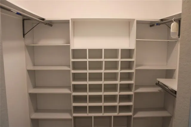 a view of an empty walk in closet