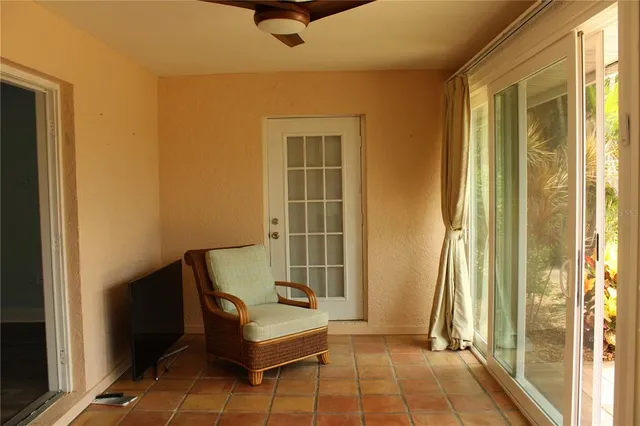 a living room with furniture and a window