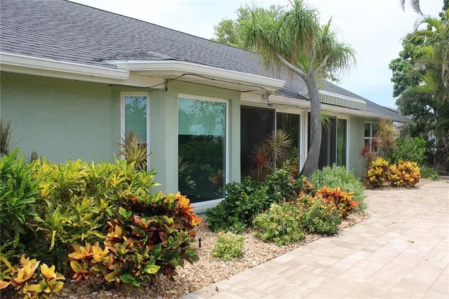 front view of a house with a small yard