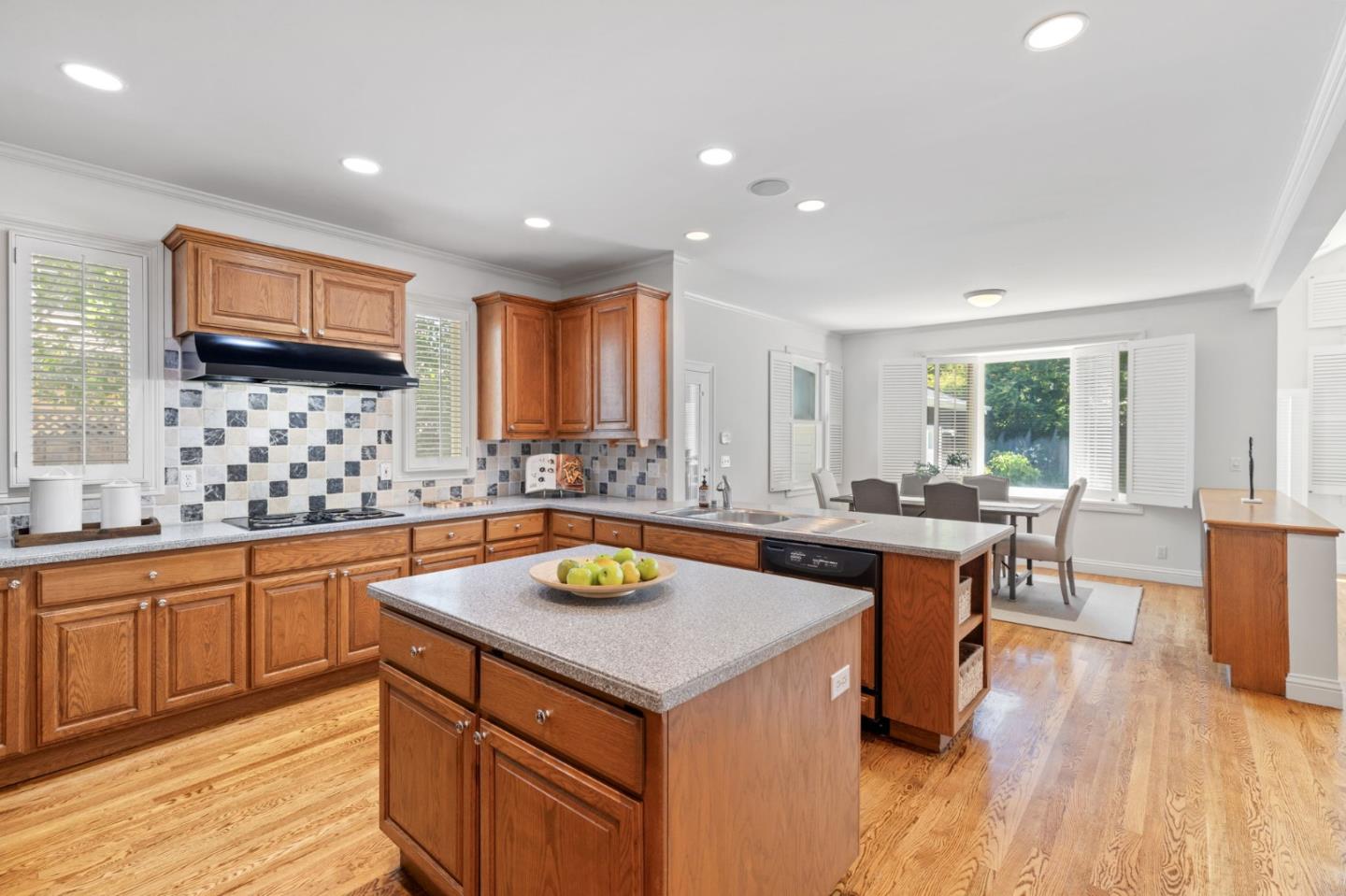 120 Gloria Circle Menlo Park, CA 94025 - Photo 17 of 83 a kitchen with a sink a counter top space and living room area