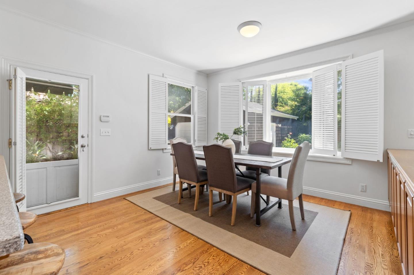 120 Gloria Circle Menlo Park, CA 94025 - Photo 22 of 83 a view of a dining room with furniture and wooden floor
