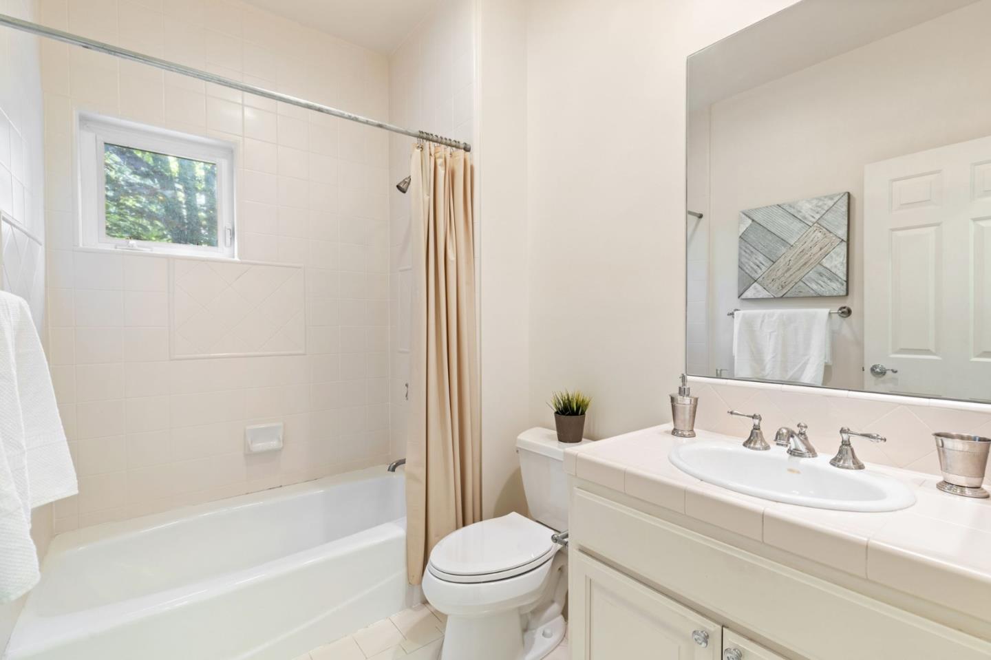 120 Gloria Circle Menlo Park, CA 94025 - Photo 31 of 83 a bathroom with a granite countertop sink toilet and a bathtub