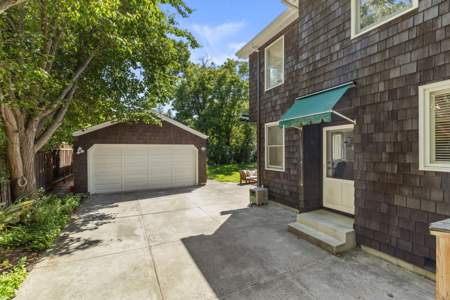 120 Gloria Circle Menlo Park, CA 94025 - Photo 48 of 83 a front view of a house with a yard and garage