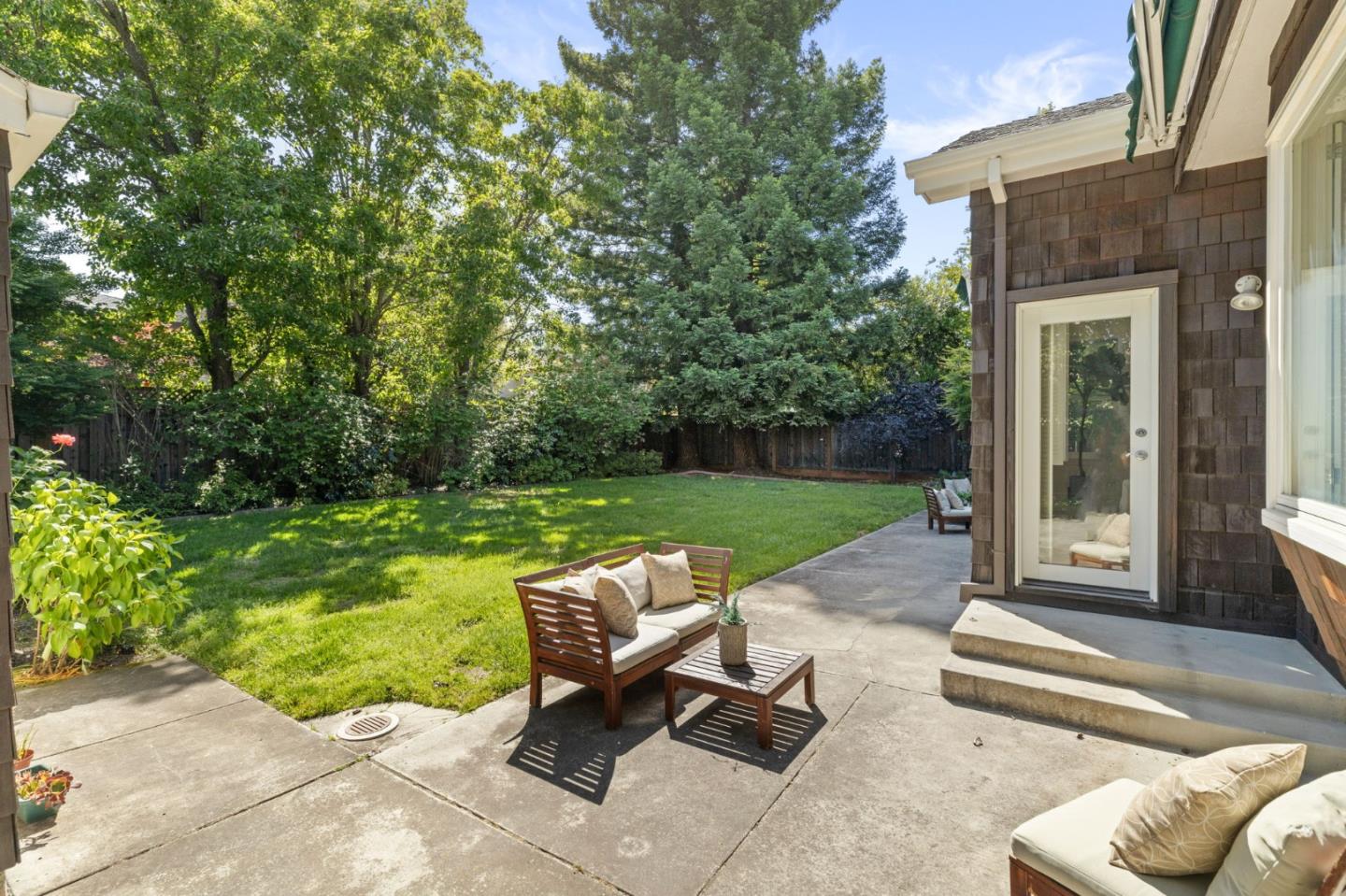 120 Gloria Circle Menlo Park, CA 94025 - Photo 51 of 83 a view of backyard with seating space and trees