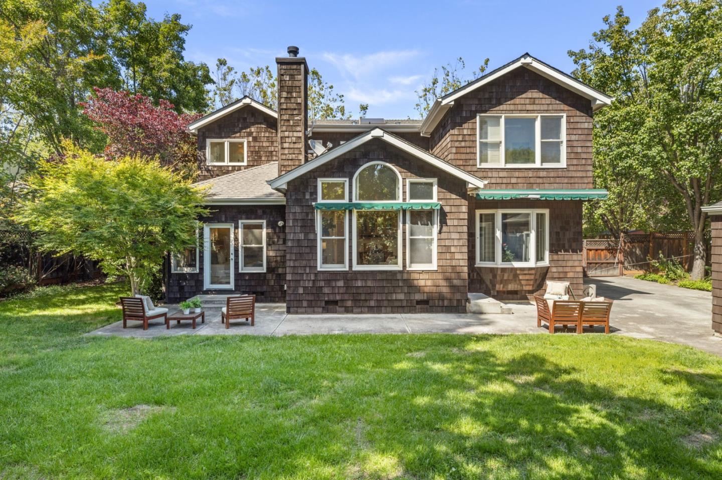 120 Gloria Circle Menlo Park, CA 94025 - Photo 53 of 83 a front view of a house with a garden and patio