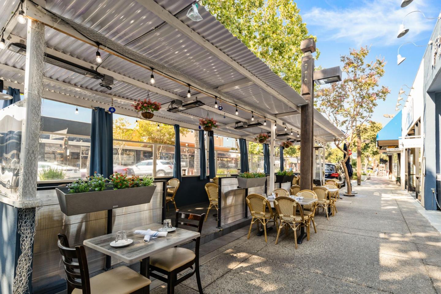 120 Gloria Circle Menlo Park, CA 94025 - Photo 73 of 83 a view of a big room with furniture large windows and a chandelier