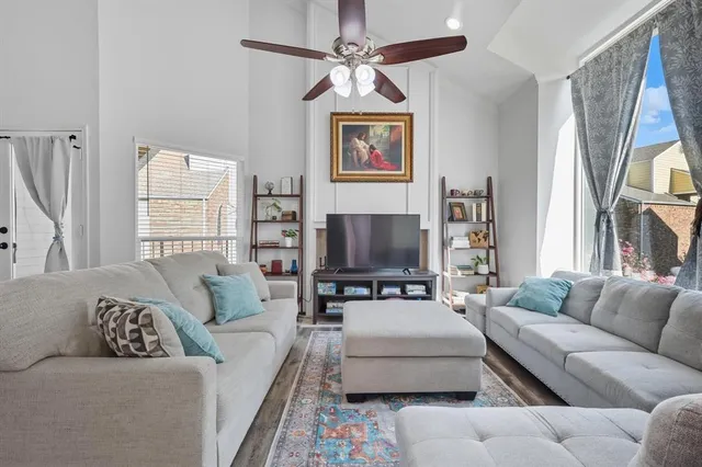 a living room with furniture or couch and a window