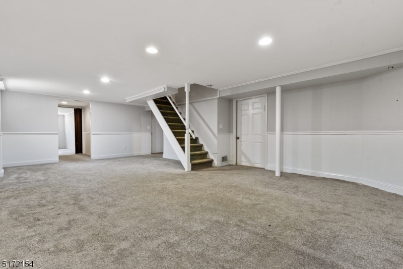 41 Prospect Road Livingston, NJ 07039 - Photo 11 of 14 an empty room with a ceiling fan