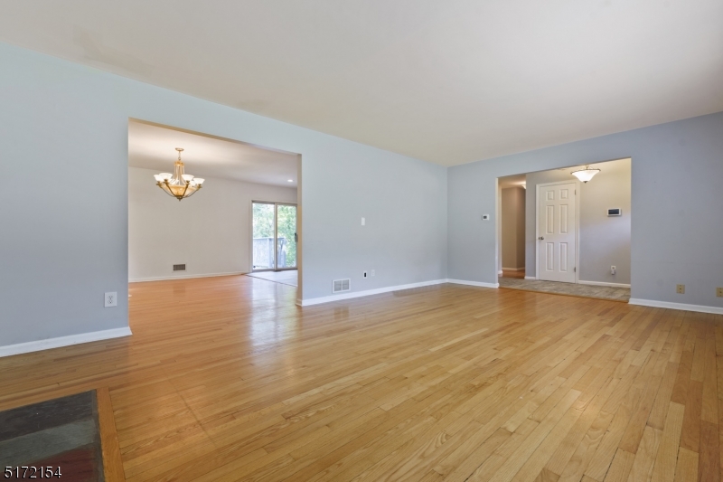 41 Prospect Road Livingston, NJ 07039 - Photo 2 of 14 a view of empty room with wooden floor
