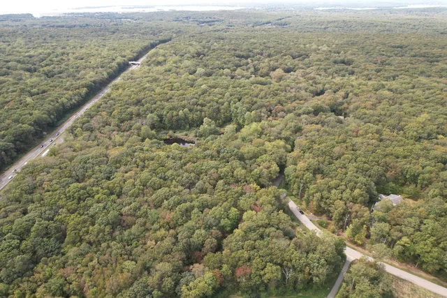 a view of a field with an outdoor space