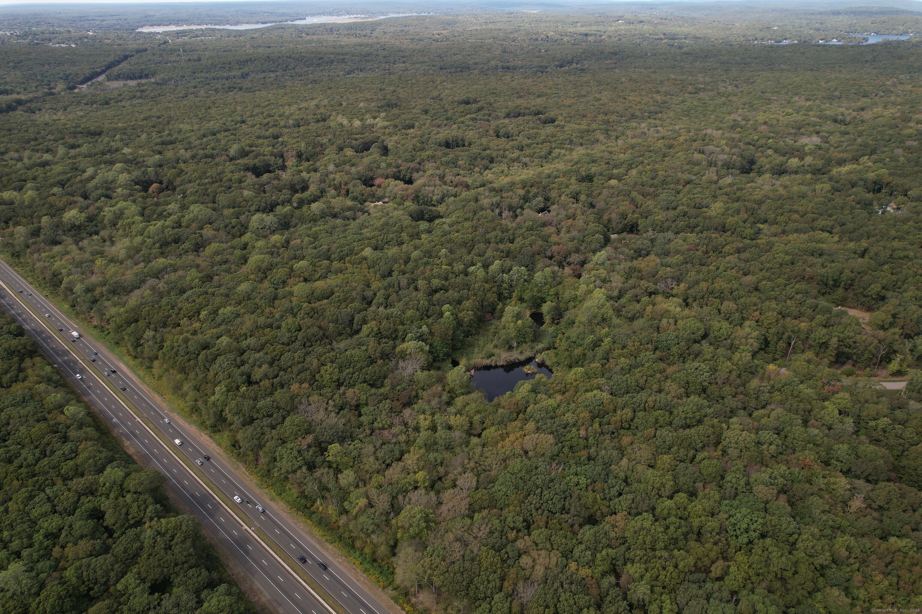 15 Short Hills Road Old Lyme, CT 06371 - Photo 23 of 31 a view of a forest from a balcony