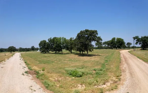 a view of lake with green space