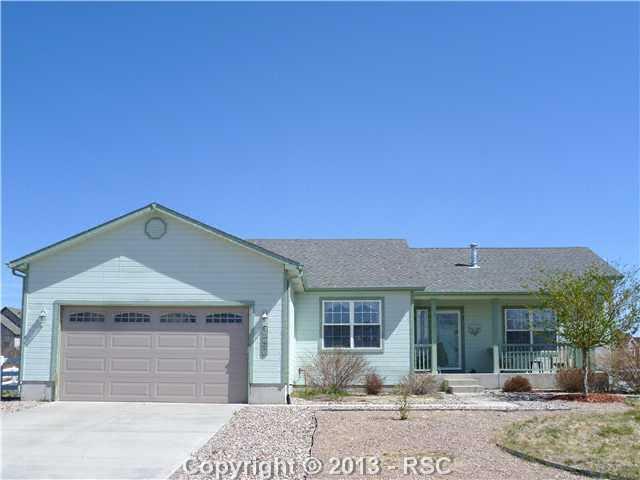 12476 Snaffle Bit Road Peyton, CO 80831 - Photo 1 of 25