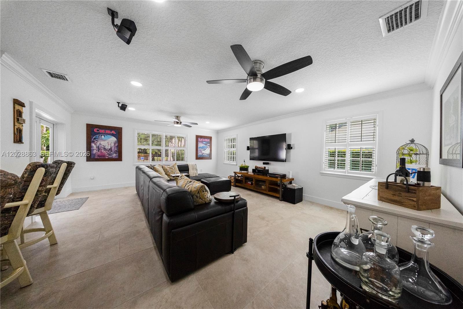 15351 Southwest 146th Street Miami, FL 33196 - Photo 20 of 86 Great Family Room to share and enjoy game days.