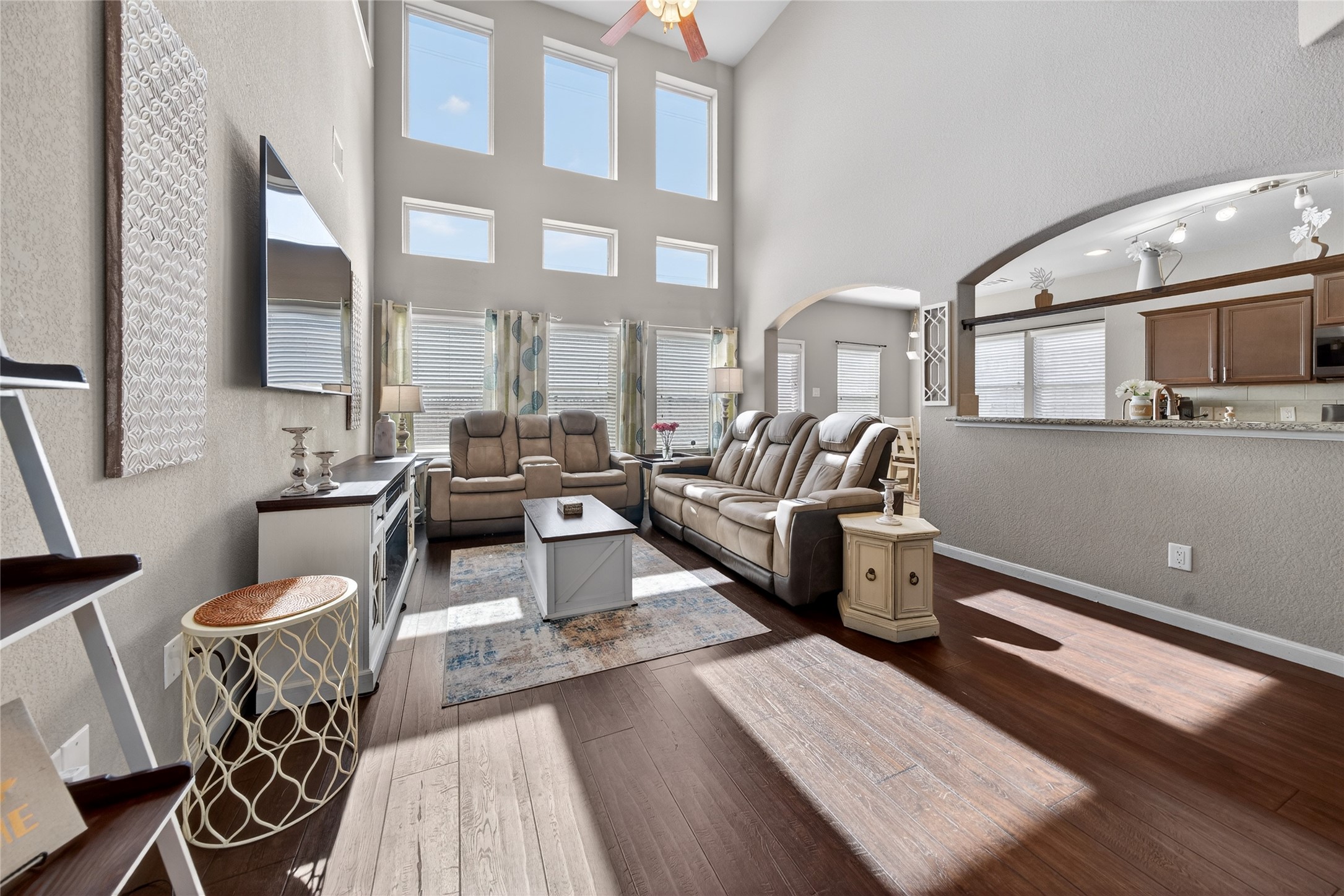 361 Lake Line Drive Alvin, TX 77511 - Photo 4 of 36 he expansive living room provides a perfect vantage point of the home's open architecture, featuring a clean view of the second-story overlook and entry.