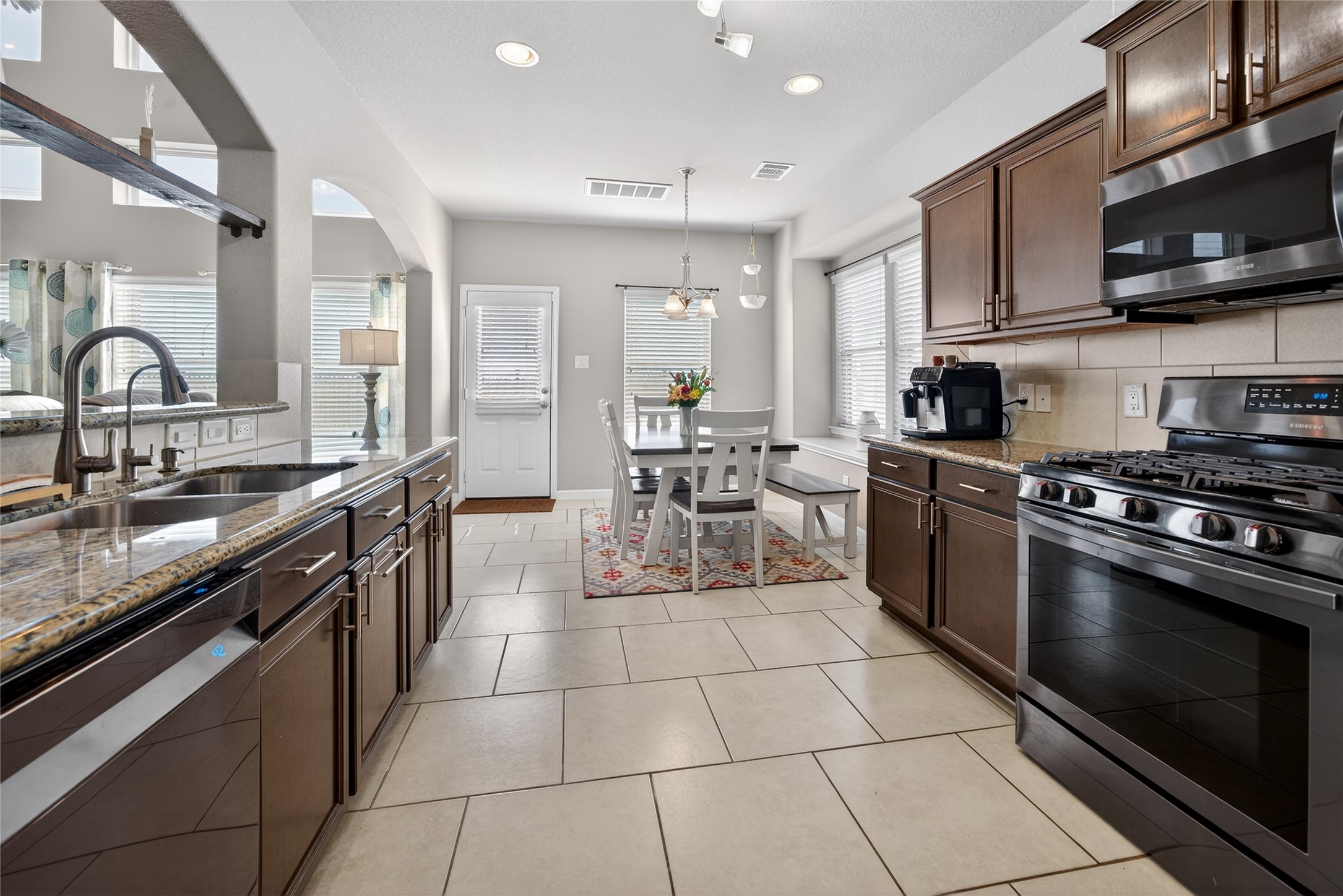 361 Lake Line Drive Alvin, TX 77511 - Photo 7 of 36 The Heart of the Home. The open-concept design ensures the cook is always part of the conversation, with a sun-drenched breakfast nook perfect for morning coffee or casual family meals.