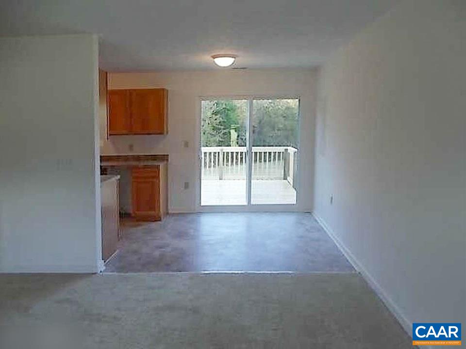 2991 Cedar Lane Road Kents Store, VA 23084 - Photo 8 of 21 a view of a kitchen with a sink and a window