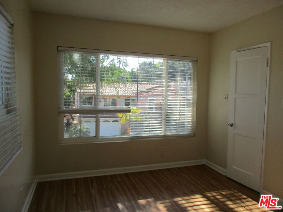 5108 Valley Ridge Avenue View Park, CA 90043 - Photo 27 of 33 a view of an empty room with a window