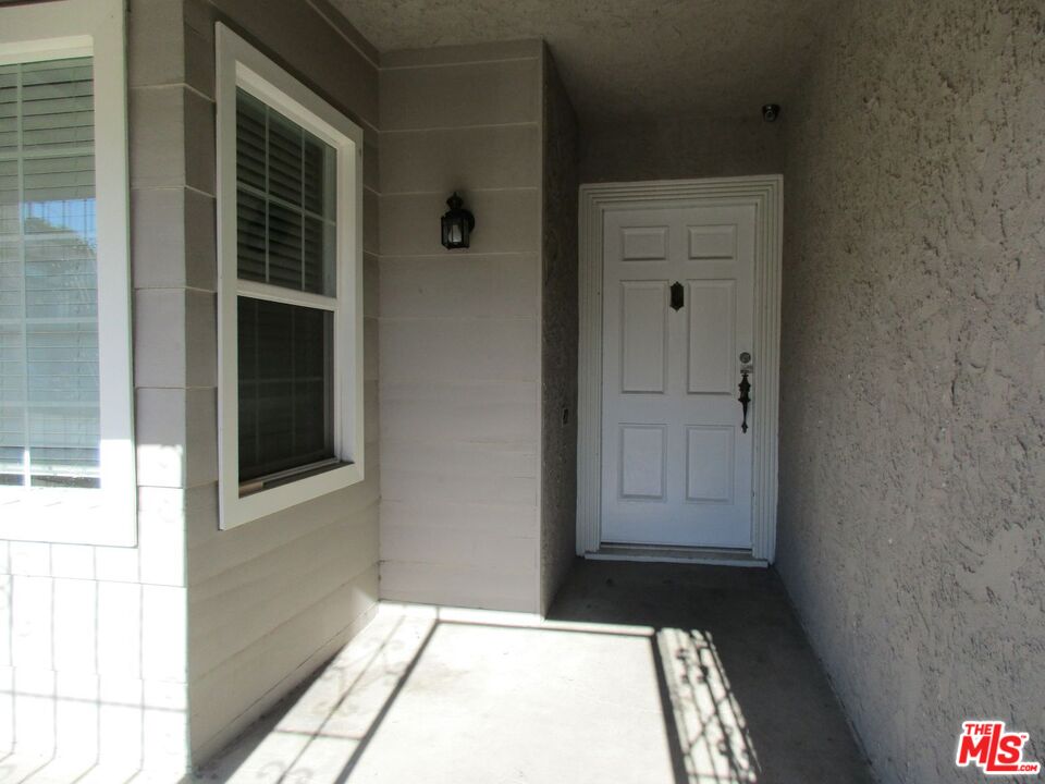 5108 Valley Ridge Avenue View Park, CA 90043 - Photo 6 of 33 a view of front door