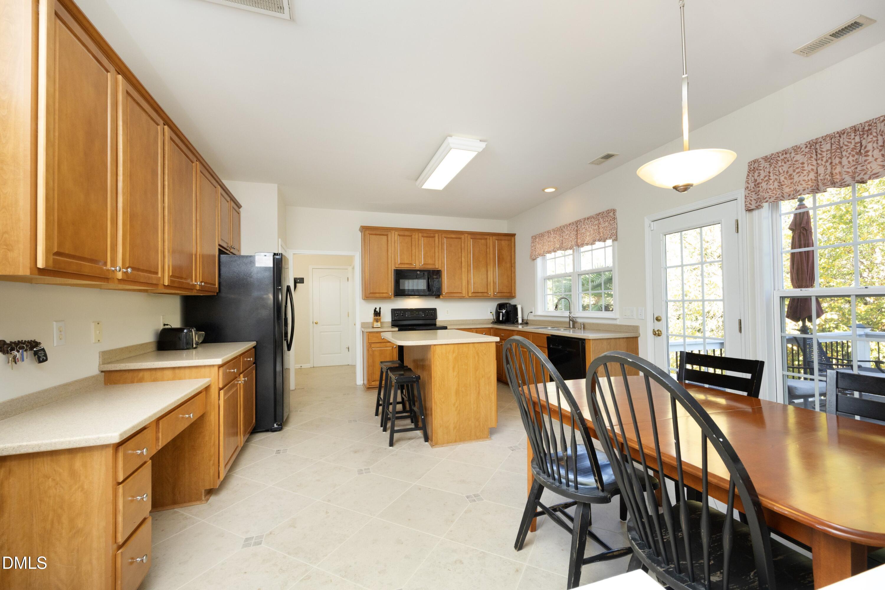 7537 Silver View Lane Raleigh, NC 27613 - Photo 12 of 50 11Breakfast_Kitchen