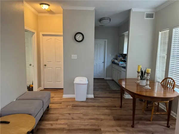 a living room with furniture and a table