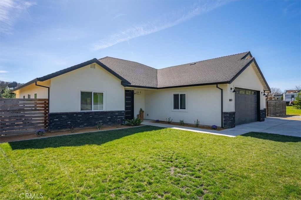 18871 Drake Road Red Bluff, CA 96080 - Photo 1 of 1 a front view of house with yard and garage