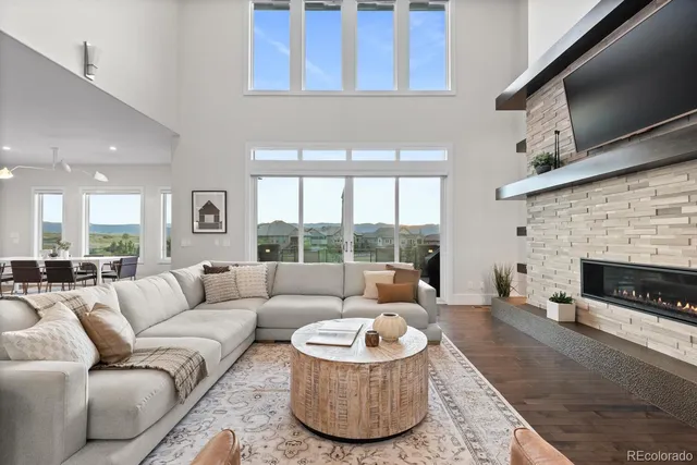 a large kitchen with a table and chairs