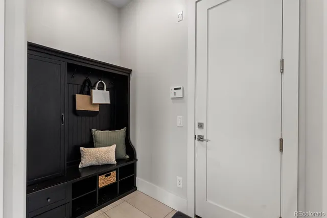 a utility room with cabinets