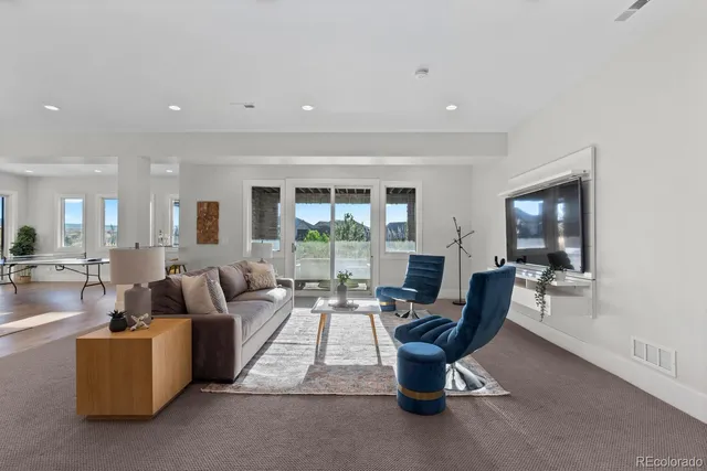 a living room with furniture and a couch