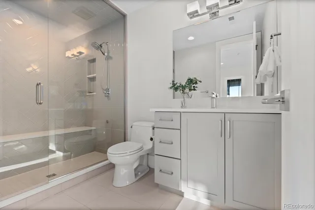 a view of a patio with couches and pool table and chairs