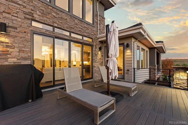 an outdoor living with furniture